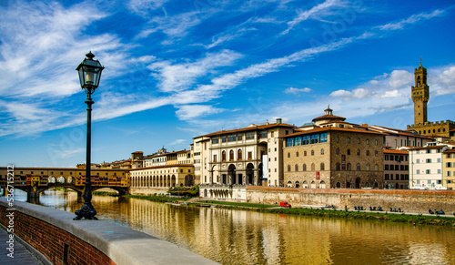 Panorama on the Lungarno and Ponte Vecchio in Florence Tuscany Italy photo