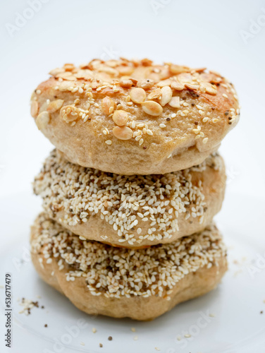 Homemade Bagels with multi grains such as sesame, perilla seeds and pumpkin seeds with white background