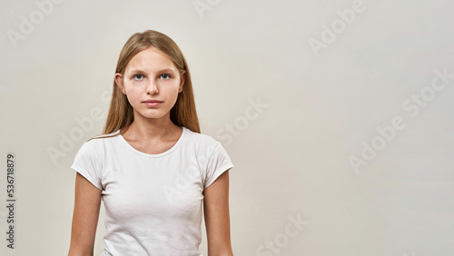 Cropped image of teenage girl looking at camera © Svitlana