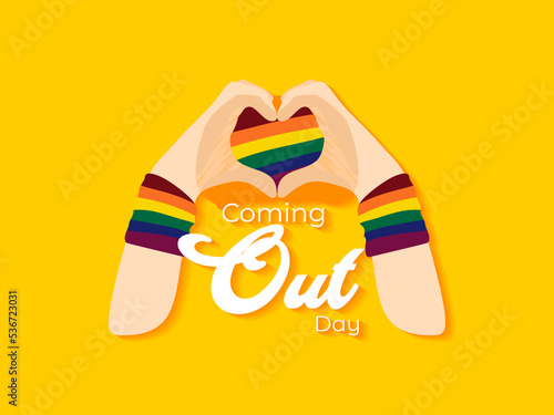 Coming out day. Hands with heart, love background.