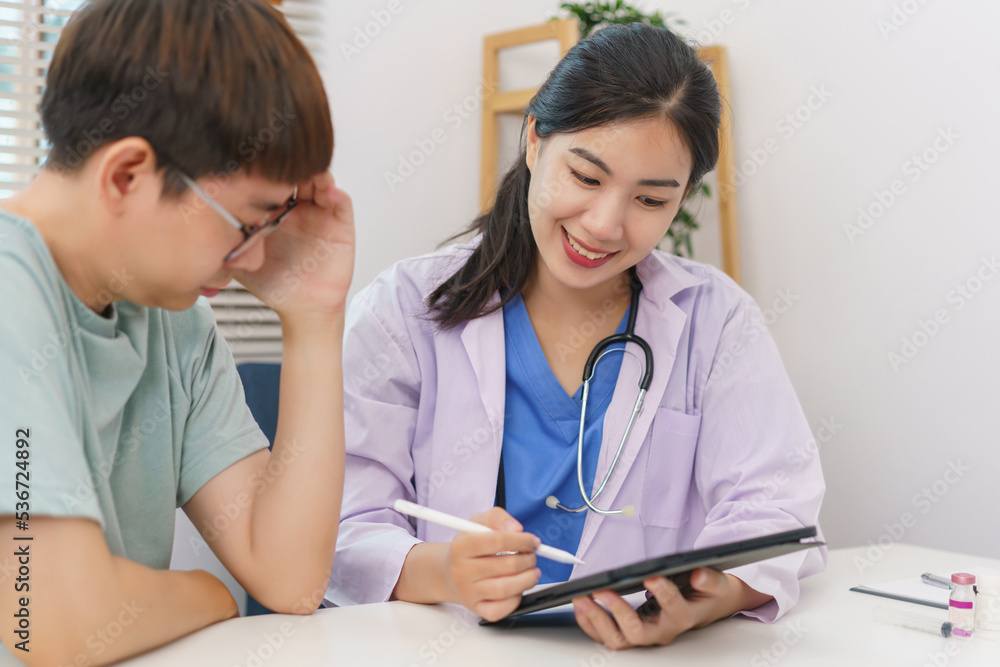 Healthcare concept, Male patient feeling headache and talk with doctor about treatment of illness Healthcare concept, Male patient feeling headache and talk with doctor about treatment of illness