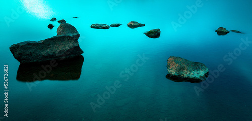 Rocks in a lake, Castle Semple Loch, Lochwinnoch, Renfrewshire, Scotland, UK photo