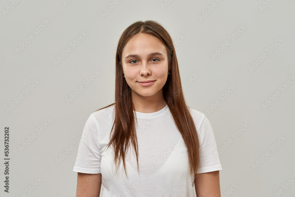 Portrait of smiling female teenage look at camera Portrait of smiling female teenage look at camera