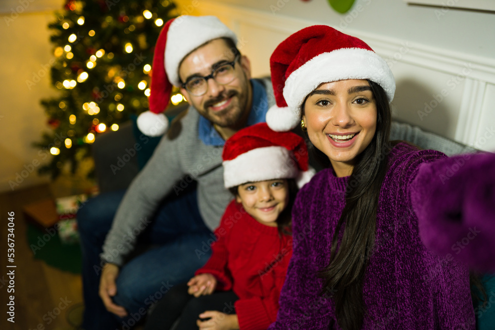 Parents looking very happy while celebrating christmas holidays Parents looking very happy while celebrating christmas holidays
