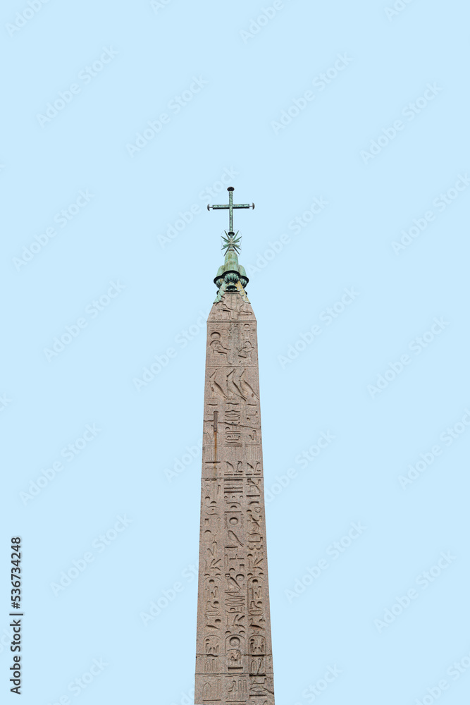 Cover page with an ancient Egyptian obelisk known as Flaminian Obelisk at Piazza del Popolo in Rome, Italy, at blue sky solid background. It holds Christian cross on the top and Egyptian hieroglyphs.