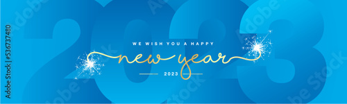 We wish you Happy New Year 2023 gold handwritten lettering tipography line design white sparkle firework light blue year 2023 background