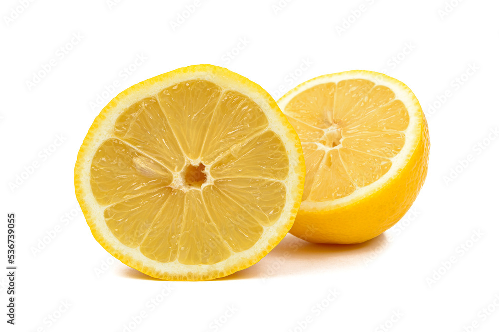 fresh lemon cut into two equal halves on insulated white background fresh lemon cut into two equal halves on insulated white background