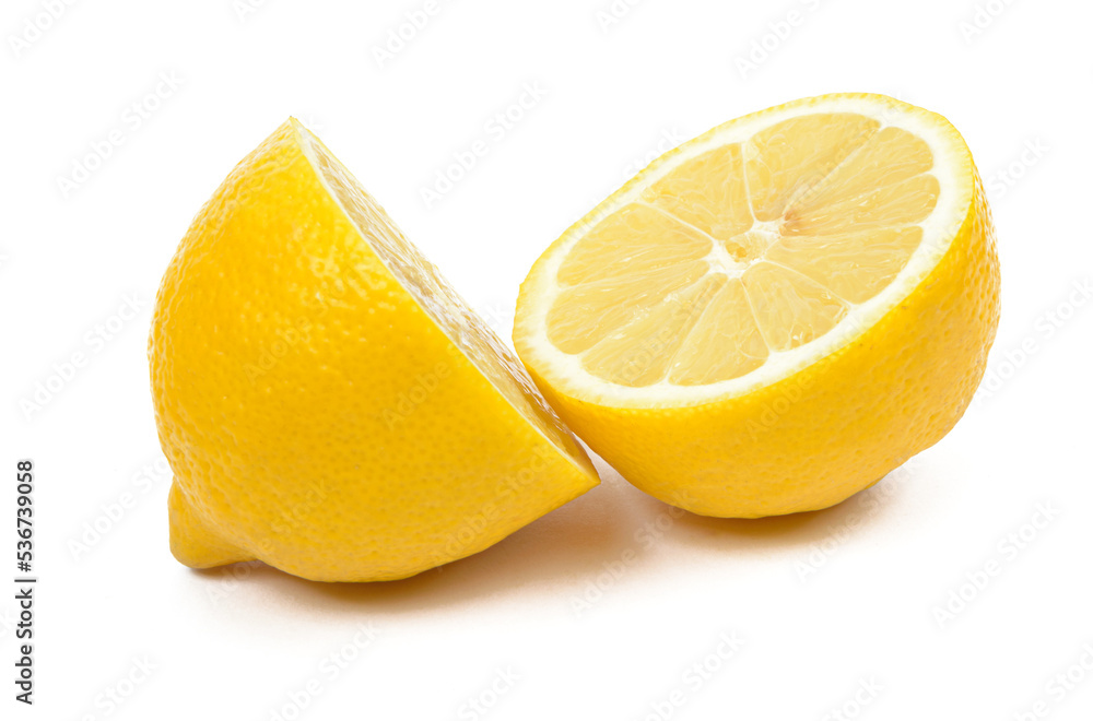 fresh lemon cut into two equal halves on insulated white background fresh lemon cut into two equal halves on insulated white background