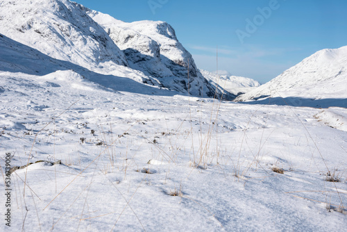 Wallpaper Mural Gorgeous Winter landscape blue sky image of view along Glencoe Rannoch Moor valley with snow covered mountains all around Torontodigital.ca
