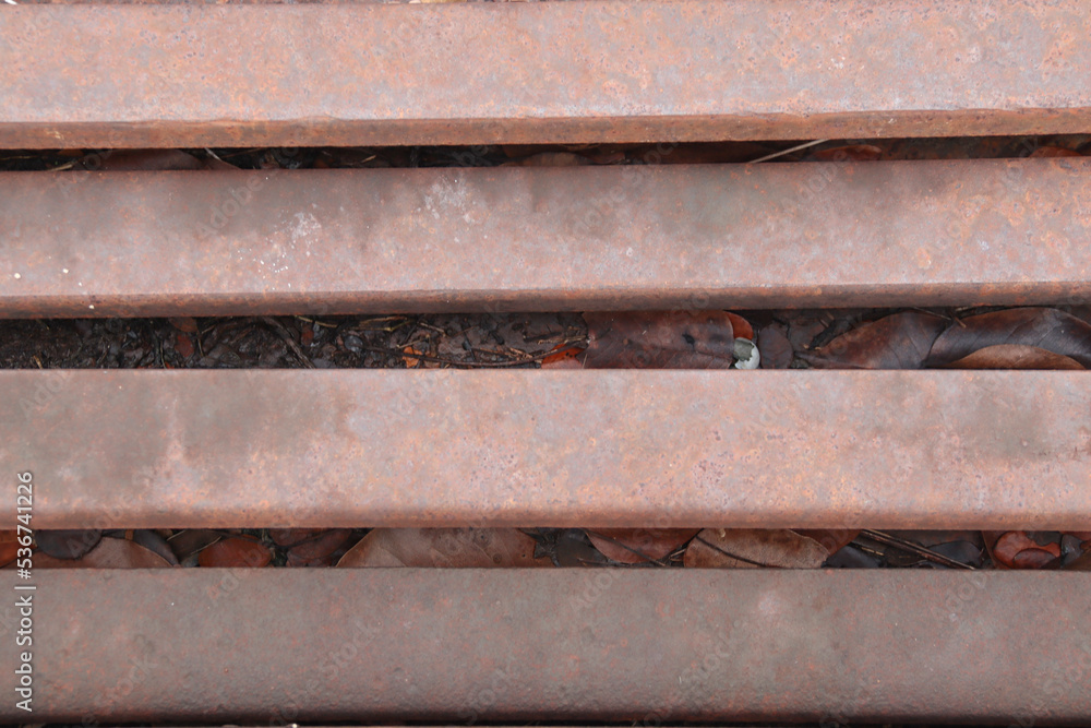 Rusty surface of old iron railroad tracks. Rusty surface of old iron railroad tracks.