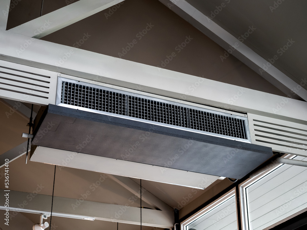 Air conditioning wall mounted ventilation system on ceiling in the white  hotel room. Hotel room air ventilation grill on the wall.. Photos | Adobe  Stock