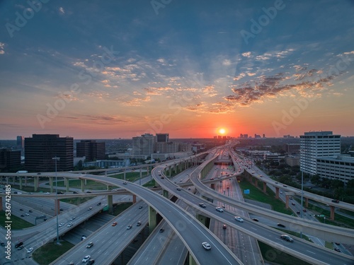 Drone shot over the High Five Interchange in Dallas, Texas, USA at sunset photo