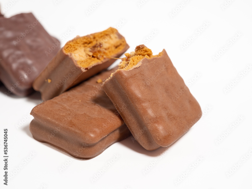 Chocolate bar on a white background. Chocolate with caramel. Chocolate bar on a white background. Chocolate with caramel.