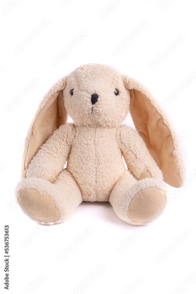 Plush bunny on a white background. Children's toy Plush bunny on a white background. Children's toy