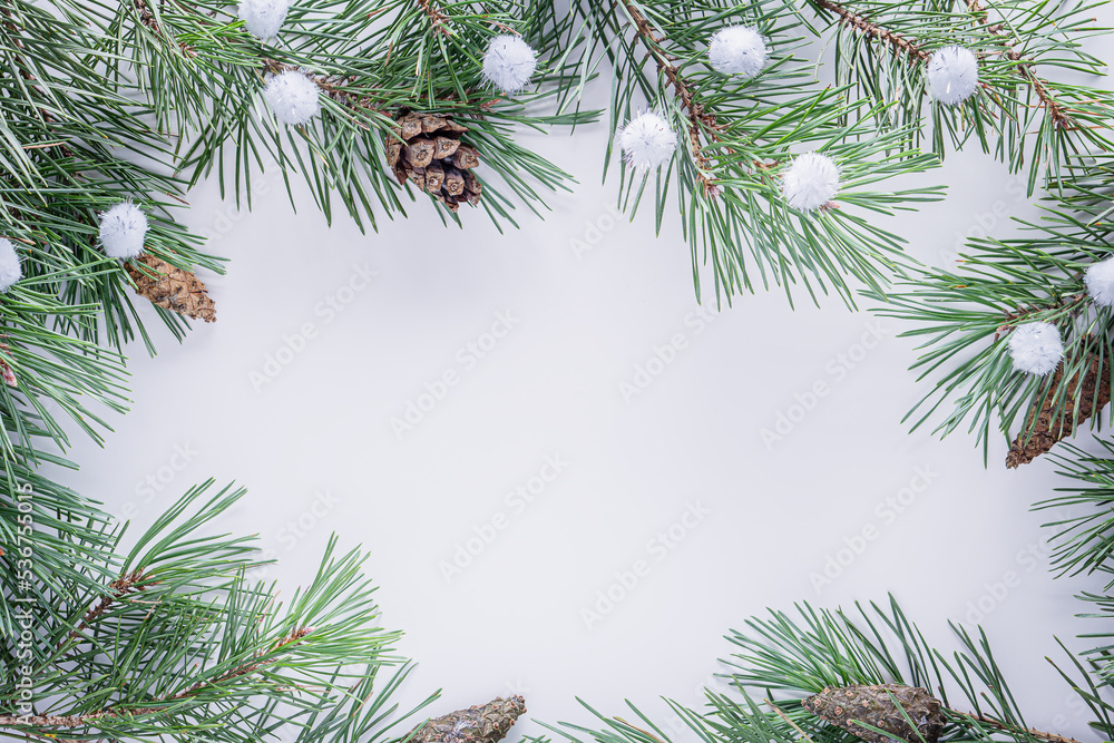 Christmas white background with fir branches. Frame made of fir tree branches with copy space. Christmas white background with fir branches. Frame made of fir tree branches with copy space.