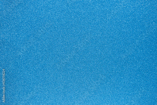 Blue glitter texture xmas background.