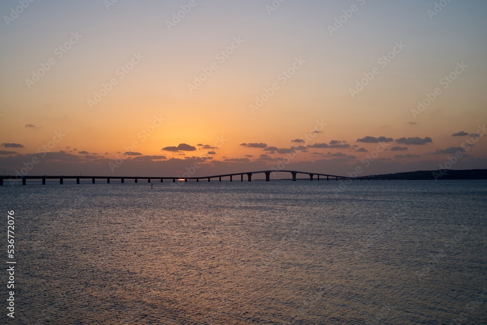 Sunset shining in the gap of Irabu Bridge