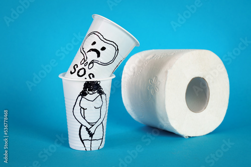 Urinary incontinence concept. Blue background.