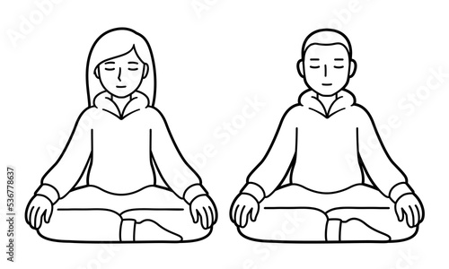 Man and woman sitting in meditation