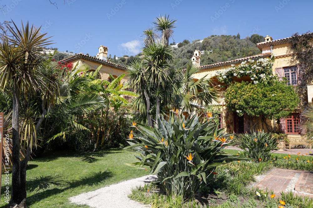 Val Rahmeh-Menton Botanical Garden from the sea town of Menton on the French riviera during a sunny spring day.