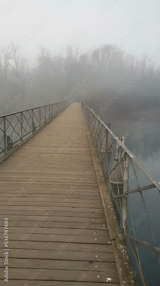 Fototapeta premium A mistically misty bridge in Northern Italy