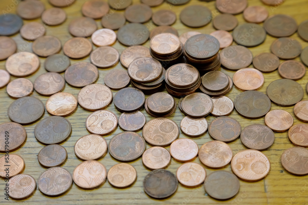 There are European Union coins on the table There are European Union coins on the table