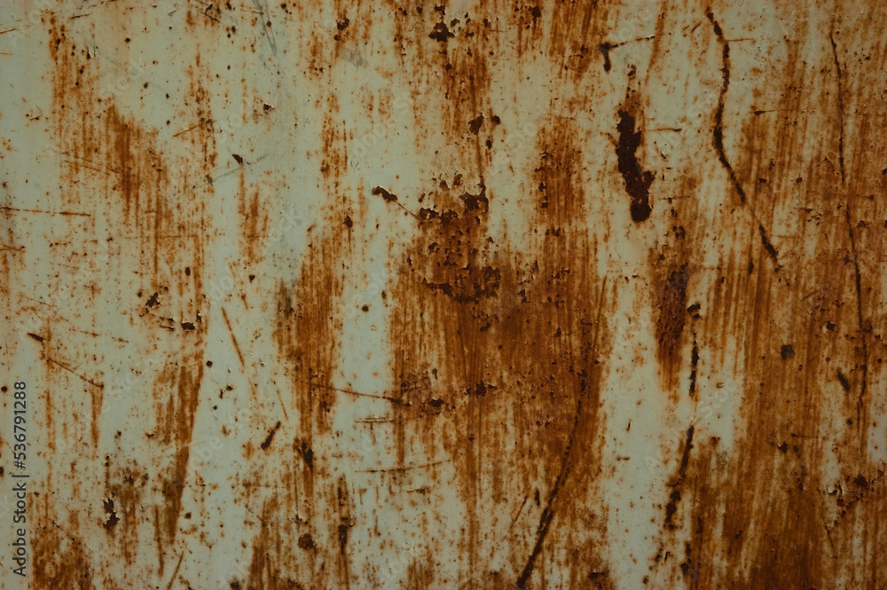 abstract grunge background: peeling paint on rusty iron