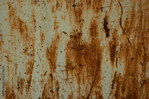 abstract grunge background: peeling paint on rusty iron