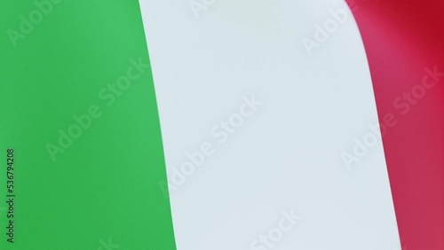 Close up of Italy, Italian Republic flag waving in the wind. Red, white, green tricolore. 4K high definition. photo