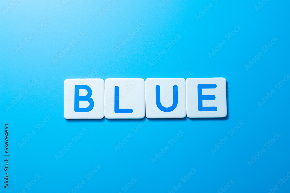 Word BLUE on blue background Word BLUE on blue background