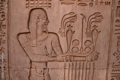 Offerings presented to God: Beautiful ancient egyptian carvings at Kom Ombo temple in Aswan 