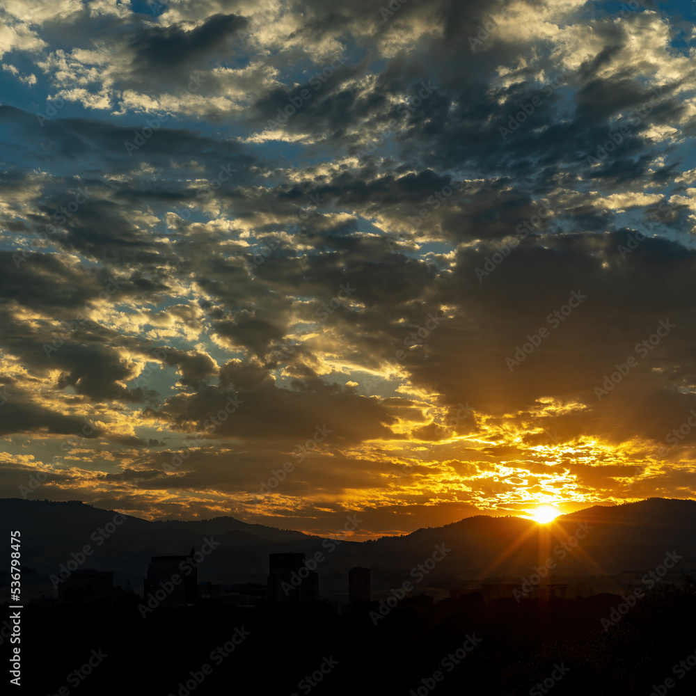 Sunrise over a silhouette of the Boise Idaho skyline