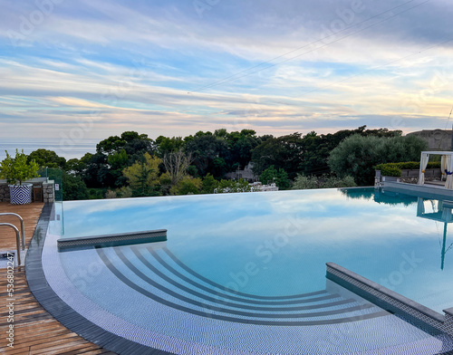 Capri resort swimming pool at sunset