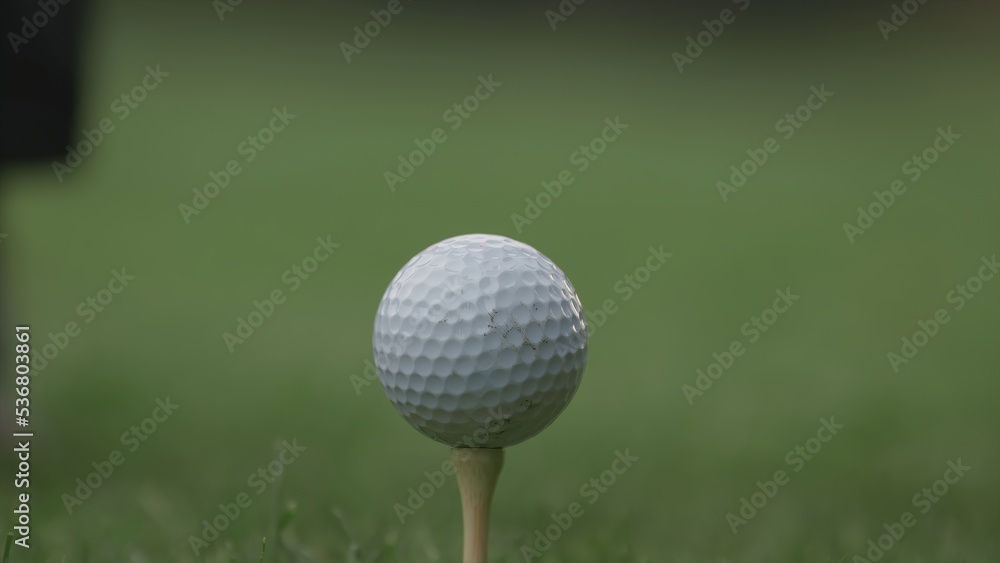 ECU Close up golf ball standing on the turf ECU Close up golf ball standing on the turf