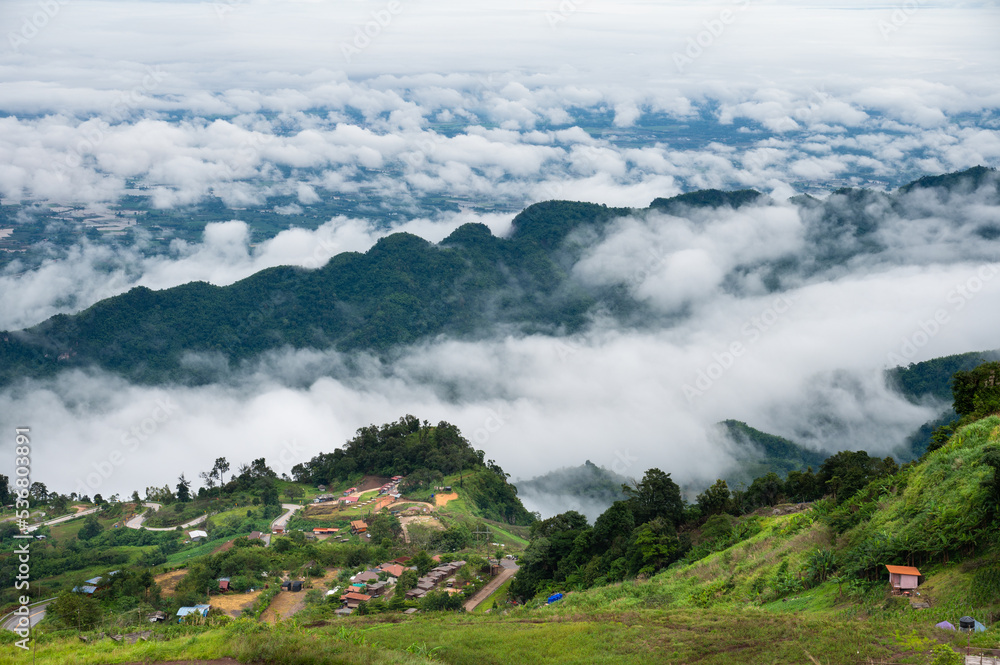 Scenery on the highest mountain in Phetchabun Province In the rainy season near winter, you can see the green nature and fog on the mountains in the morning, Phu Thap Boek in Thailand.