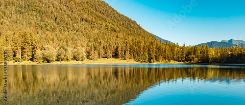 Beautiful alpine summer view with reflections at the famous Pillersee lake, Tyrol, Austria