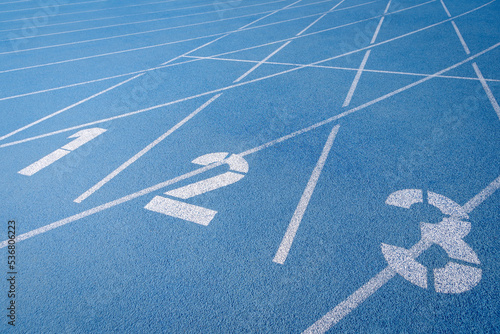 Blue running track and numerals photo