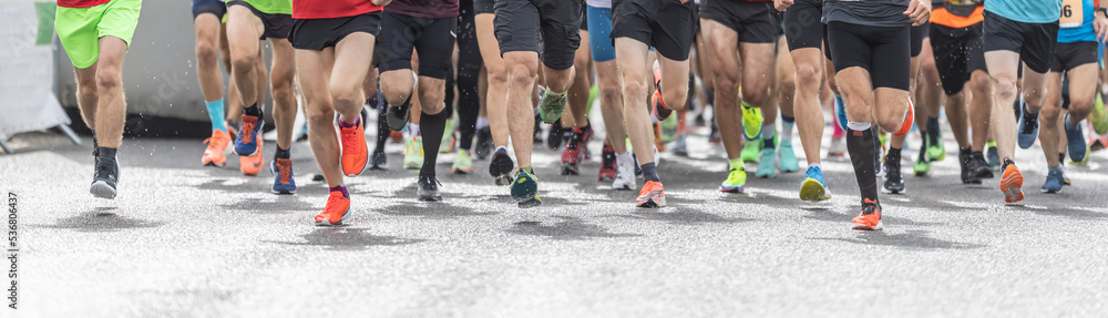 Banner of legs of runners starting the run during a competition