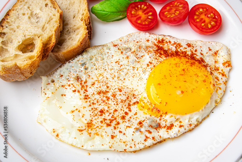fried egg breakfast food, tomato, healthy meal snack on the table copy space food background 