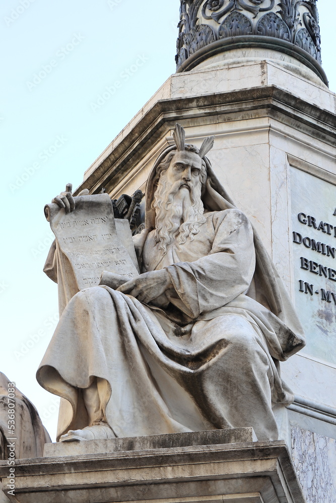 Obraz premium Patriarch Moses Sculpture on the Column of the Immaculate Conception at Piazza Mignanelli Square in Rome, Italy