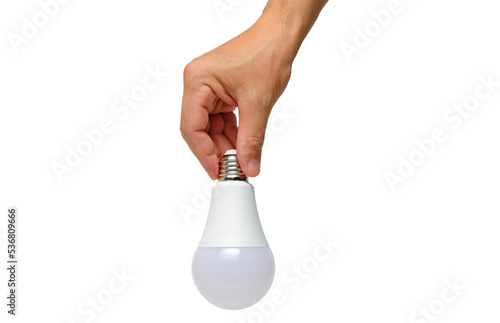 LED eco light bulb in hand on white background.
