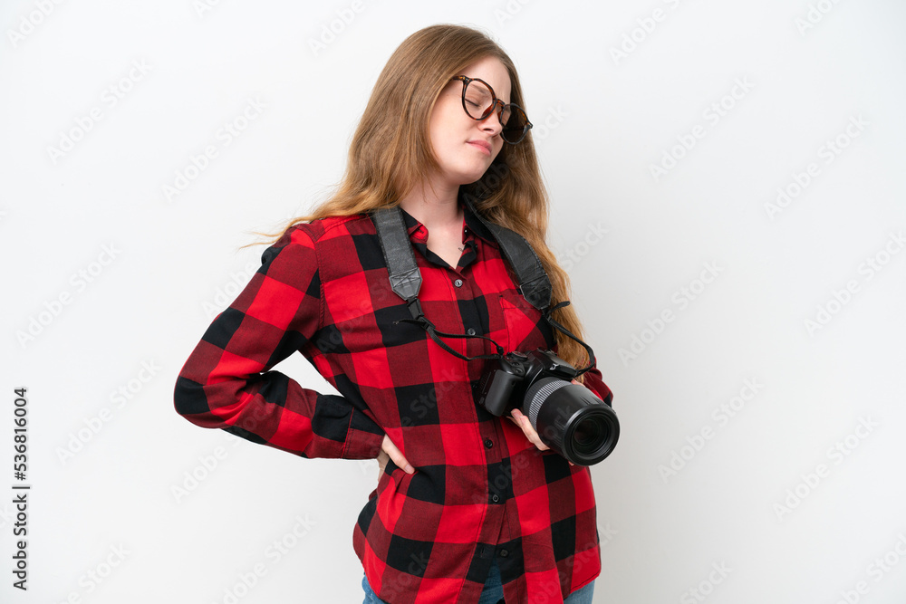 Young photographer pretty woman isolated on white background suffering from backache for having made an effort