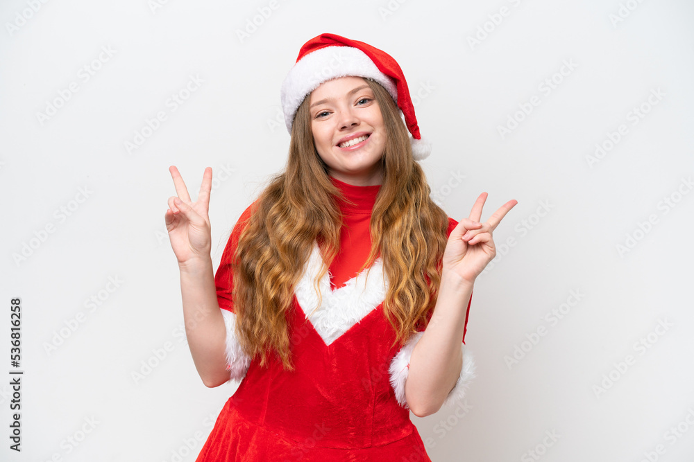 Young caucasian woman with Christmas dress isolated on white background showing victory sign with both hands Young caucasian woman with Christmas dress isolated on white background showing victory sign with both hands