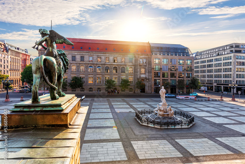 Obraz na płótnie The Schiller Monument on the Gendarmenmarkt at sunrise, Berlin, Germany w salonie