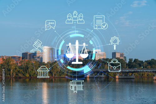 Panoramic view, Washington towards Arlington financial downtown, city skyline over Potomac River. Virginia, USA Glowing hologram legal icons. The concept of law, order, regulations and digital justice