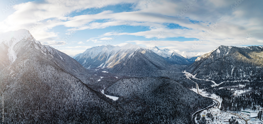 Aerial panoramic view on the mountain valley in winter