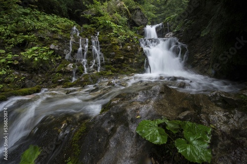 The Urlatoarea waterfall in the Bucegi Natural Park. Photograph taken with long exposure. photo