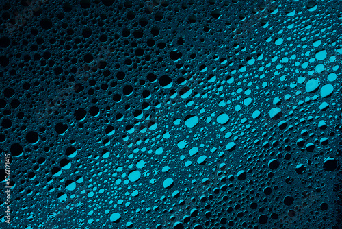 Blue abstract, texture background of soap bubbles on water. Background for screen saver, cover, wallpaper.