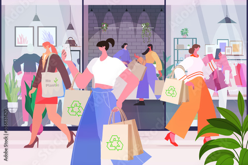 people walking with eco friendly natural bags in shopping mall sustainable lifestyle package free zero waste concept