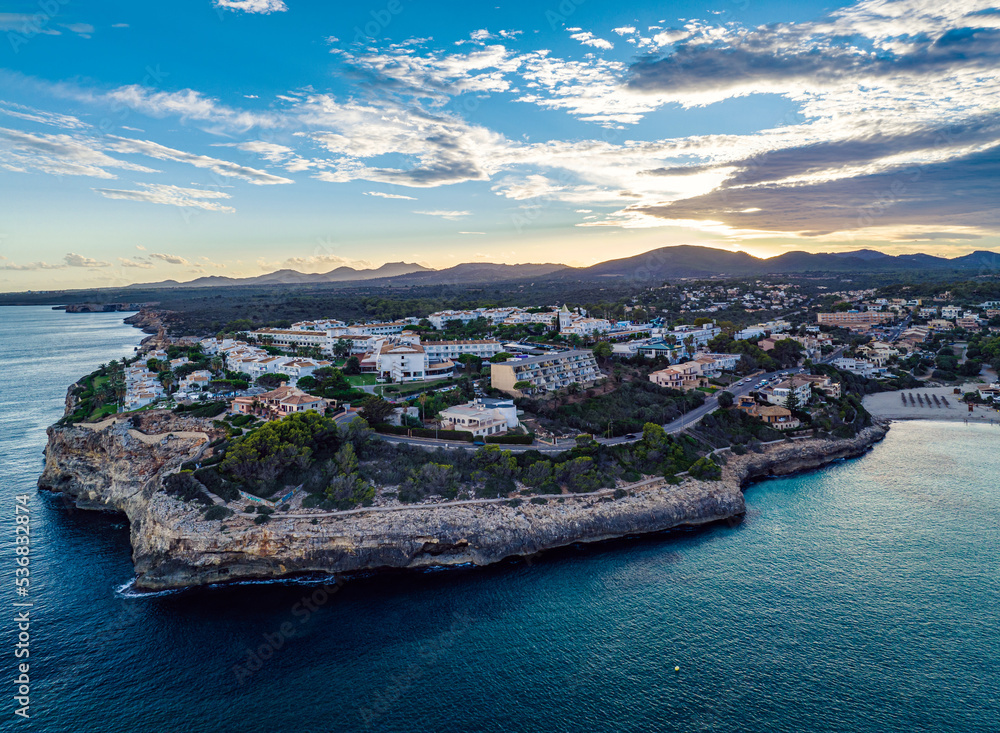 Sunset over Cala Anguila-Cala Mendia from a drone, Porto Cristo, Majorca, Spain, Europe